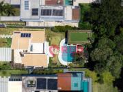 Casa com 5 quartos à venda, 402 m² por R$ 4.815.000...