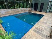 Casa com 5 suítes à venda, 313 m² por R$ 5.990.000...