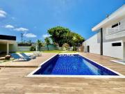 Casa com 5 suítes à venda, 416 m² por R$ 3.800.000...