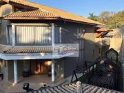 Casa com 5 suítes à venda, 890 m² por R$ 3.200.000...