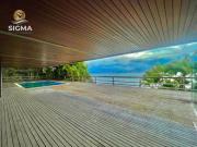 Casa com 5 suítes, piscina e vista para o mar com 2...