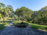 Casa com 6 dormitórios à venda, 1224 m² por R$...