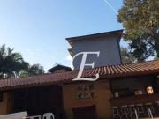 Casa com 6 dormitórios à venda, 200 m² por R$...