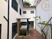Casa com 6 dormitórios à venda, 212 m² por R$...