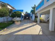 Casa com 6 dormitórios à venda, 238 m² por R$...