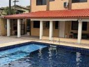 Casa com 6 dormitórios à venda, 345 m² por R$...