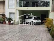 Casa com 6 dormitórios à venda, 360 m² por R$...