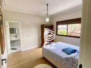 Casa com 6 dormitórios à venda, 385 m² por R$...