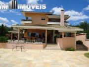 Casa com 6 dormitórios à venda, 410 m² por R$...