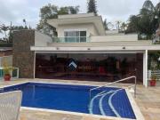 Casa com 6 dormitórios à venda, 447 m² por R$...