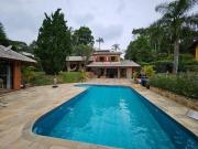 Casa com 6 dormitórios à venda, 456 m² por R$...