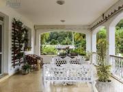 Casa com 6 dormitórios à venda, 587 m² por R$...