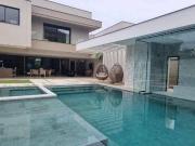 Casa com 6 dormitórios à venda, 667 m² por R$...