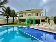 Casa com 6 dormitórios à venda, 670 m² por R$...