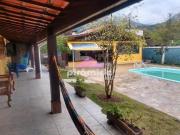 Casa com 6 dormitórios à venda, 700 m² por R$...