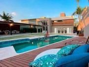 Casa com 6 dormitórios à venda, 910 m² por R$...