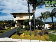 Casa com 6 dormitórios à venda, 941 m² por R$...