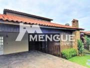 Casa com 6 dormitórios e 4 vagas de garagem, à venda no...