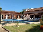 Casa com 7 dormitórios à venda, 689 m² por R$...