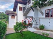 Casa com 7 dormitórios à venda, 865 m² por R$...