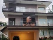 Casa com 7 dormitórios à venda, 929 m² por R$...