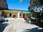 CASA COM AMPLO ESPAÇO DE QUINTAL EM LOCALIZAÇÃO...