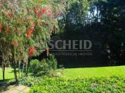 Casa com amplo terreno Chácara Flora