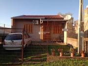 Casa com dois dormitórios, terreno todo cercado no...