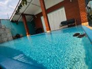 CASA COM PISCINA A VENDA NA PRAIA EM ITANHAÉM