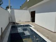 CASA COM PISCINA A VENDA NA PRAIA EM ITANHAÉM