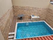 CASA COM PISCINA A VENDA NA PRAIA EM ITANHAÉM/SP