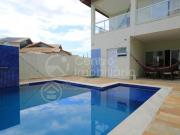 Casa com piscina e 3 quartos em Peruíbe, no bairro Jd...