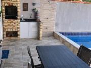Casa com piscina e área gourmet em Itanhaém