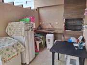 Casa com piscina e área gourmet em Peruíbe