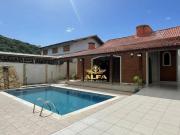 Casa com piscina, lareira e espaço gourmet no Jardim...