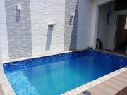 Casa com piscina na praia grande vila caiçara