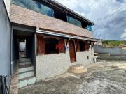 Casa com quatro quartos e três vagas de garagem no...