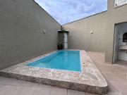 Casa com quintal piscina e churrasqueira próxima do mar...
