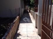 Casa com terreno amplo à venda no Bairro Lorenzi em... Casa com terreno amplo à venda no Bairro Lorenzi em...