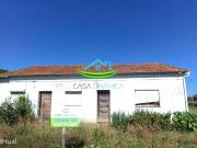 Casa com terreno e dois poos