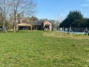 CASA CON 4 AMB. CON PILETA BRANDSEN