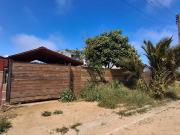 CASA CON AMPLIO TERRENO Y MARAVILLOSA VISTA A QUEBRADA Y MAR