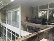 Casa con excelente terreno con fácil salida a Periférico...