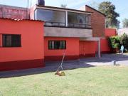 Casa con jardín