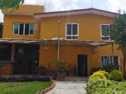 Casa con local comercial en Estrada Cajigal