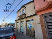 Casa con local en planta baja