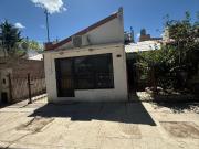 Casa con local y ampliación