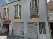 CASA CON LOCALES EN VENTA EN EXCELENTES CONDICIONES....