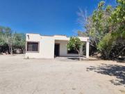 CASA CON AMPLIO TERRENO