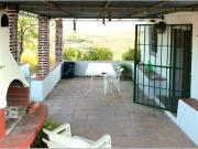 Casa con terreno en venta en Coín